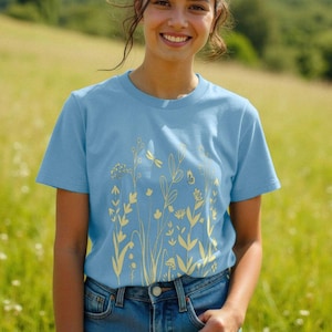 Wildflowers Women&#39;s Organic Cotton Tee | Butterfly & Dragonfly Floral T-shirt | Yellow Flowers On Pastel Shirt