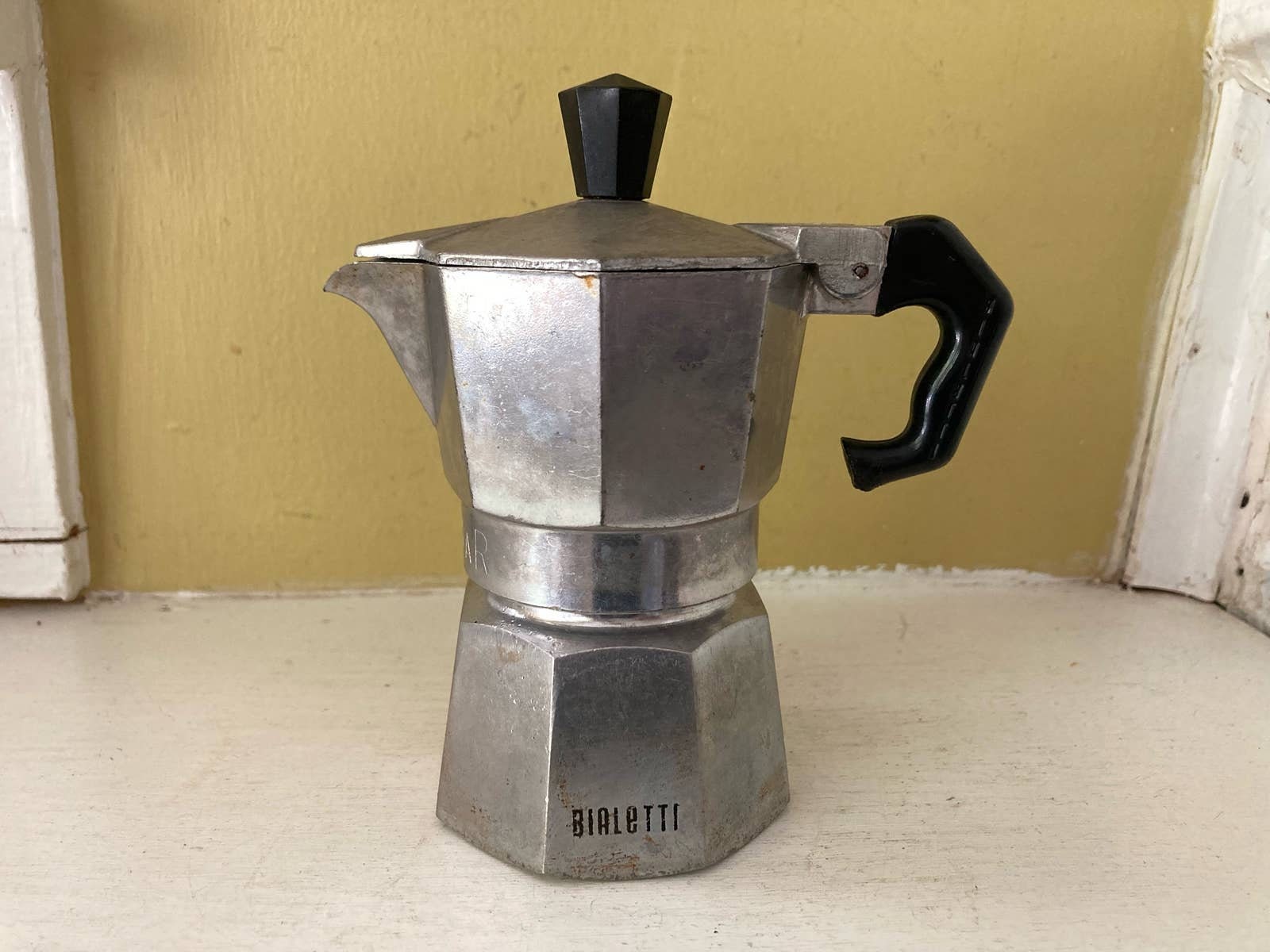 Vintage Bialetti Stovetop Espresso Coffee Pot and Five Black Porcelain Cups  with Metal Holders