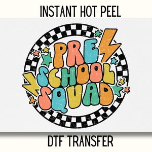 May include: A colorful graphic design with a checkered border and the text "PRESCHOOL SQUAD" in a retro style. The design is perfect for a t-shirt or other apparel.