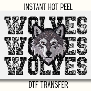 May include: A white background with the words "WOLVES" repeated three times in black with a distressed look. A silver glitter wolf head is centered between the words. The words "INSTANT HOT PEEL" and "DTF TRANSFER" are also included in black.