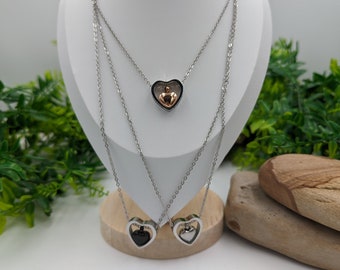 ashes necklace for pets /human, comes in 3 colours gold ,black or silver hearts with silver chain
