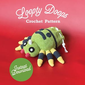 May include: A crochet pattern for a green and black spider with yellow stripes. The pattern is called "Loopty Doops Crochet Pattern" and is available for instant download.