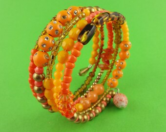 Orange Memory Wire Bangle - Stacked beaded coils bracelet with mixed orange and golden beads - vibrant boho gypsy wrap around layered look