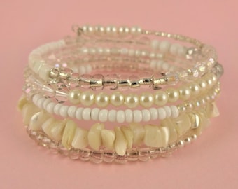 White Memory Wire Bracelet - Stacked coil bangle with mixed white and clear beads, and small dangly charms - Snow Queen/Princess Jewelry