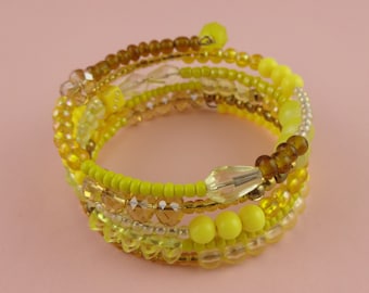 Yellow and Gold Memory Wire Bangle - Stacked coil bracelets with mixed beads in warm, sunny colours - cheerful happy summer boho jewellery