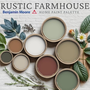 May include: A collection of paint cans in various colors, including green, brown, and white, arranged on a white brick background. The image features the text "RUSTIC FARMHOUSE HOME PAINT PALETTE" and is decorated with leaves and flowers.