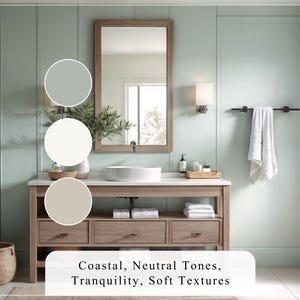 Puede incluir: Un ba&ntilde;o con una pared verde claro, un tocador de madera con un lavabo blanco, un espejo y un toallero. El tocador tiene tres cajones y dos estantes. Los estantes est&aacute;n llenos de toallas. El tocador est&aacute; hecho de madera con un acabado marr&oacute;n claro. El ba&ntilde;o tambi&eacute;n tiene una cesta de mimbre y una planta. El texto en la imagen dice "Coastal, Neutral Tones, Tranquility, Soft Textures".