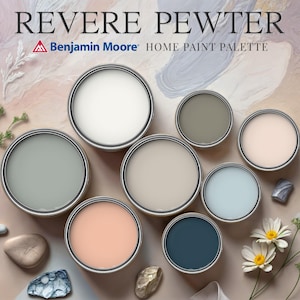 May include: A paint color palette featuring eight paint samples in small metal containers. The colors are white, light gray, beige, light pink, light blue, and dark blue. The palette is labeled "Revere Pewter Home Paint Palette" with the Benjamin Moore logo.