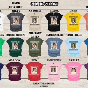May include: A color chart displays various t-shirts in different colors, each featuring a photo and the text "Forever in Kindergarten." Colors include white, gray, natural, black, daisy, orange, green, blue, and more. The design is by Even the Stones.
