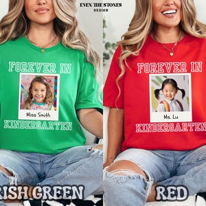 May include: Green and red t-shirts with the text "FOREVER IN" above a photo of a child. The green shirt says "Miss Smith KINDERGARTEN" and the red shirt says "Ms. Lu KINDERGARTEN". The bottom of the shirts say "IRISH GREEN" and "RED".