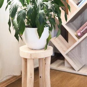 bedside table,
handmade furniture,
round stool,
plant display,
ash wood furniture,
mini coffee table,
indoor plant stand,
handmade stool,
small end table,
small wooden stool,
modern coffee table,
ash wood decor,
round coffee table