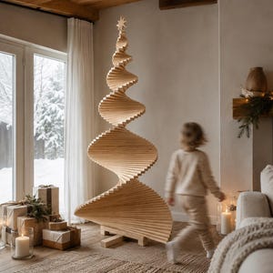 May include: A tall, light-colored wooden Christmas tree sculpture featuring a spiraling, tiered design made of stacked horizontal slats. The structure tapers toward the top, which is topped with a small, carved wooden star ornament.