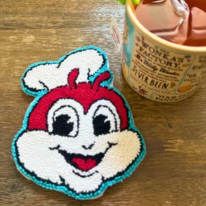 Jollibee-Inspired Punch Needle Coaster – Handmade Cotton Mug Rug – Cute Filipino Mascot Decor – Kawaii Coffee Mat – One of a Kind