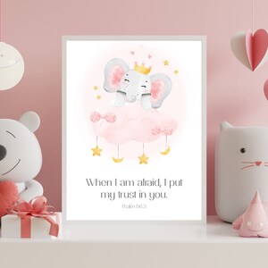 May include: A watercolor illustration of a pink cloud with a gray elephant wearing a gold crown. The elephant is sitting on the cloud with stars and moons around it. The text below the image reads "When I am afraid, I put my trust in you. Psalm 56:3".