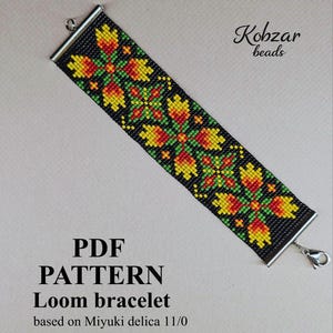 Op de afbeelding: Een rechthoekige geweven armband met een zwarte achtergrond en een herhalend bloemenpatroon van gele, oranje en groene kralen. De armband heeft zilverkleurige metalen uiteinden en een karabijnsluiting. Tekst: Kobzar beads, PDF PATTERN, Loom bracelet, based on Miyuki delica 11/0, KM-1.