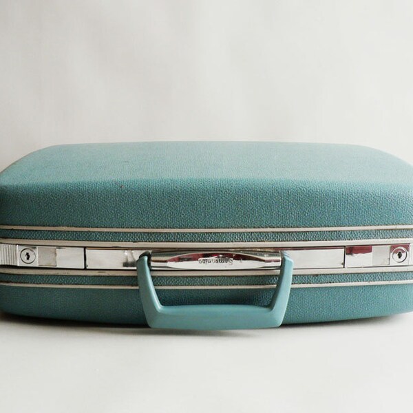Turquoise Samsonite Silhouette Suitcase