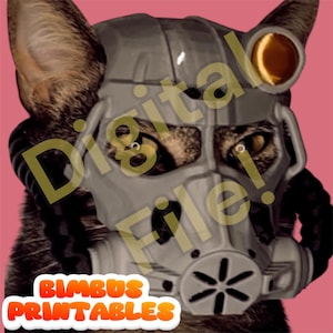 May include: A cat wearing a gray gas mask with a black strap and a gold-colored visor. The cat's eyes are visible through the mask. The text "Digital File!" is superimposed on the image. The text "BLIMBUS PRINTABLES" is in a red and yellow speech bubble at the bottom of the image.