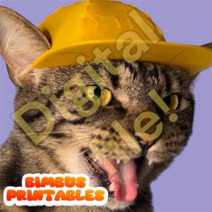 May include: A close-up of a tabby cat wearing a yellow construction worker hat. The cat has its tongue sticking out and its eyes are wide open. The cat is looking directly at the camera.