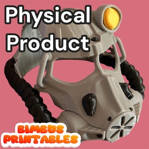 May include: A gray and black helmet with the text "Physical Product" and "Bimbus Printables". The helmet has a yellow lens and a black hose. The background is a solid pink color.