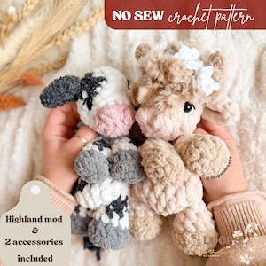 May include: Two handmade crochet cow plushies. One is black and white, the other is tan and cream. The plushies have soft, textured yarn and are held in someone's hands. The image includes text that says "NO SEW crochet pattern" and "Highland mod & 2 accessories included."