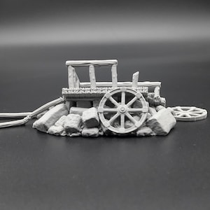 Broken cart on a pile of debris for miniature games 3D printed | 28mm | scatter terrain
