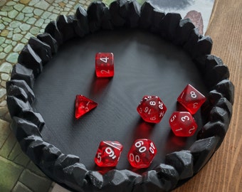 Dice tray decorated with a ring of stones