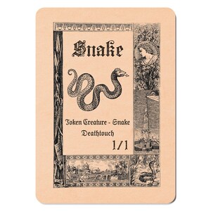 May include: Tan card with the word "Snake" in a gothic font. A detailed illustration of a snake is in the center. The card also includes the text "Token Creature - Snake Deathtouch 1/1" and several small illustrations.