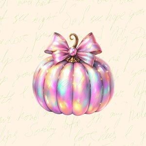 May include: A pink iridescent pumpkin with a large pink bow and a sparkly jewel in the center. The pumpkin is decorated with gold accents.