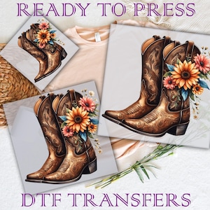 May include: Two pairs of brown cowboy boots with floral embellishments. The boots are ready to press, with the text "READY TO PRESS" and "DTIF TRANSFERS" visible in the image.