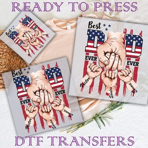 May include: DTF transfers with a "Best Dad Ever" design. The design features a large hand with smaller hands below, with the names Victor, Sandra, and Emma. The text "READY TO PRESS" and "DTF TRANSFERS" are also visible.