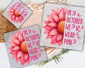 May include: DTF transfers featuring a pink flower design with the text "In October We Wear Pink" and pink ribbons. The transfers are ready to press and are displayed with a light-colored t-shirt.