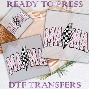 May include: Three heat transfer designs featuring the word "MAMA" in a pink and black checkered pattern with a lightning bolt design. The designs are ready to press onto clothing.