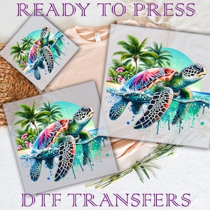May include: DTF transfers featuring a colorful sea turtle design. The turtle has a vibrant shell with red, pink, and blue hues, swimming in turquoise water with palm trees in the background. The words "READY TO PRESS" and "DTF TRANSFERS" are visible.