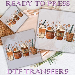 May include: DTF transfers featuring fall-themed coffee drinks with whipped cream, pumpkins, and cinnamon sticks. The transfers include the text "Pumpkin Spice" on a mug. The words "READY TO PRESS" and "DTF TRANSFERS" are also visible.