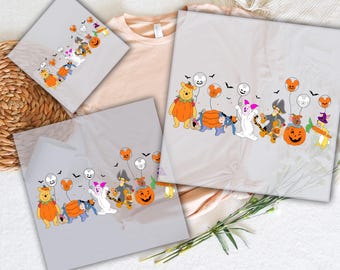 May include: A set of iron-on transfers featuring a group of Disney characters dressed in Halloween costumes. The characters include Winnie the Pooh, Tigger, Piglet, and Eeyore. The transfers are ready to be pressed onto fabric.