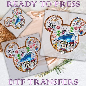 May include: A set of two iron-on transfers featuring Mickey Mouse ears with a nautical theme. The transfers feature Mickey Mouse, Minnie Mouse, Donald Duck, Goofy, and a cruise ship. The text "READY TO PRESS" and "DTIF TRANSFERS" are also included.