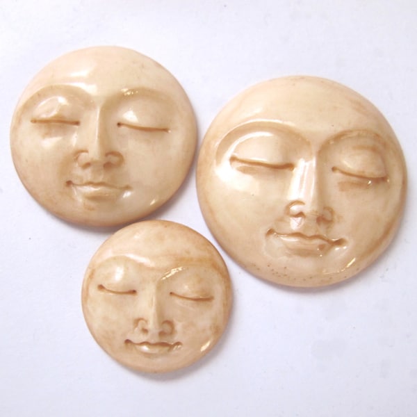 MS Carved Bone Tea Stained Round Moon Faces Closed Eyes Fair Trade Bali