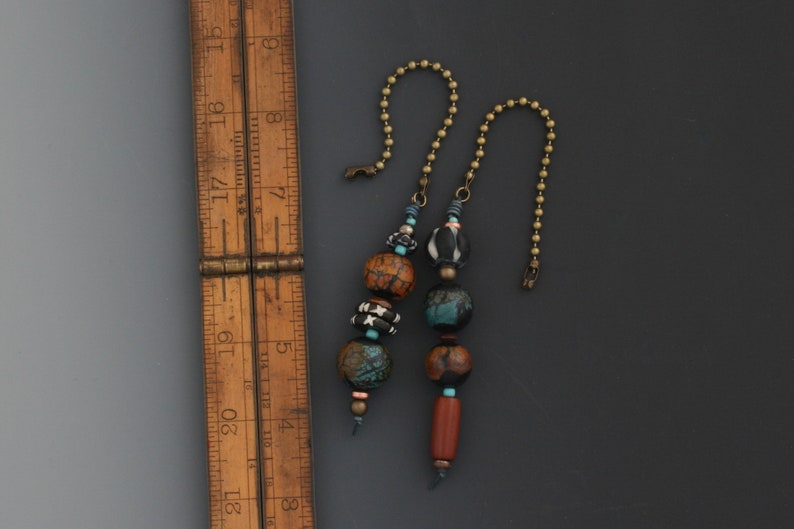 Fan pulls with handmade and hand beaded beads.