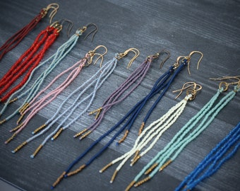 Long seed beaded earrings inspired by Pantone's Top Ten Colors for 2024.