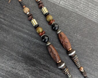 Long beaded earrings with wood and vintage glass.