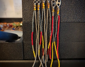 Gray, yellow, and red handmade long seed beaded earrings.