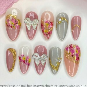 Pink Cat Eye Press On Nails: Dried Flowers & Bow Charms