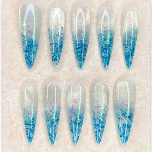 Ocean Wave Cat Eye Press On Nails: Glittery Blue Stiletto Style