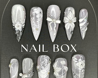 Uñas rosa suave con efecto ojo de gato, dije de lazo floral 3D, set de purpurina cromada para novias.
