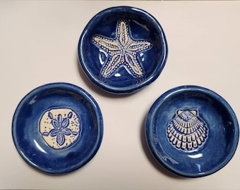 Three piece set of Nautical Trinket Sauce Dishes: Starfish Scallop Shell, Sanddollar Handcrafted Pottery. Round Clay Dinnerware.