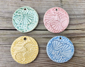 Four Pastel Nautical Shell Ceramic Pendants