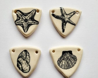 Four Nautical Ceramic Pendants