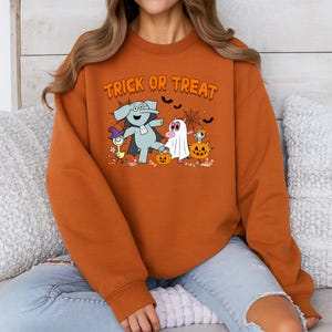 Trick or Treat Elephant Piggie Halloween Shirt | Cute Children&#39;s Book Character Tee | Reading Costume Sweatshirt Gift