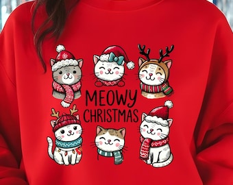 May include: Red Christmas sweatshirt with a graphic of six cats wearing Santa hats and reindeer antlers. The text "MEOWY CHRISTMAS" is printed below the cats.