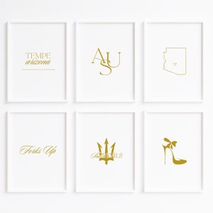 Op de afbeelding: Zes gouden ingelijste prints met witte achtergronden. De prints tonen de tekst "Tempe Arizona", de letters "ASU", een omtrek van de staat Arizona met een hart in het midden, de tekst "Forks Up", een drietand met de tekst "Sun Devils", en een hoge hak met een strik.